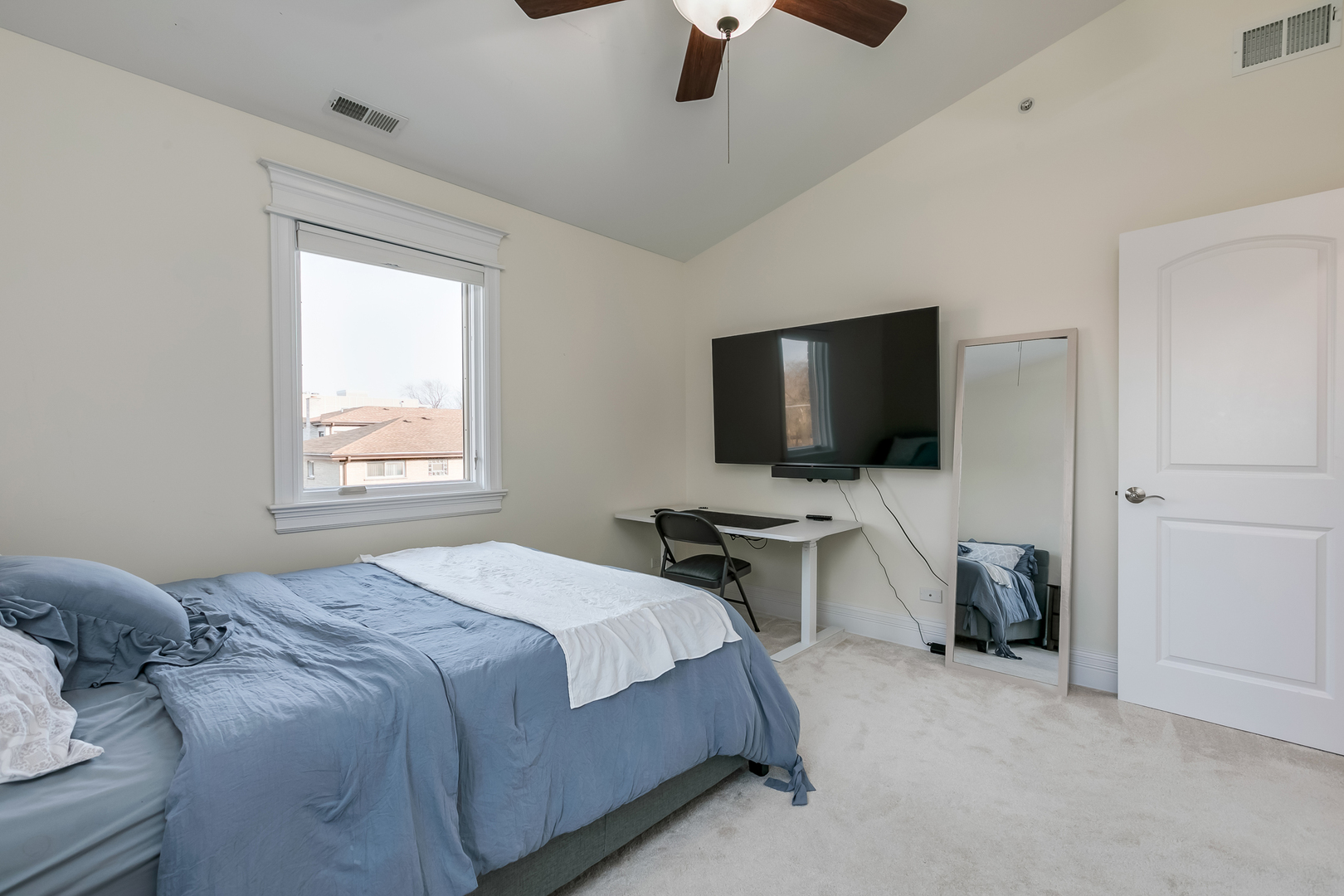 463 Summit Avenue, Unit D Park Ridge, IL 60068 - Photo 26 of 30 a bedroom with bed tv and window