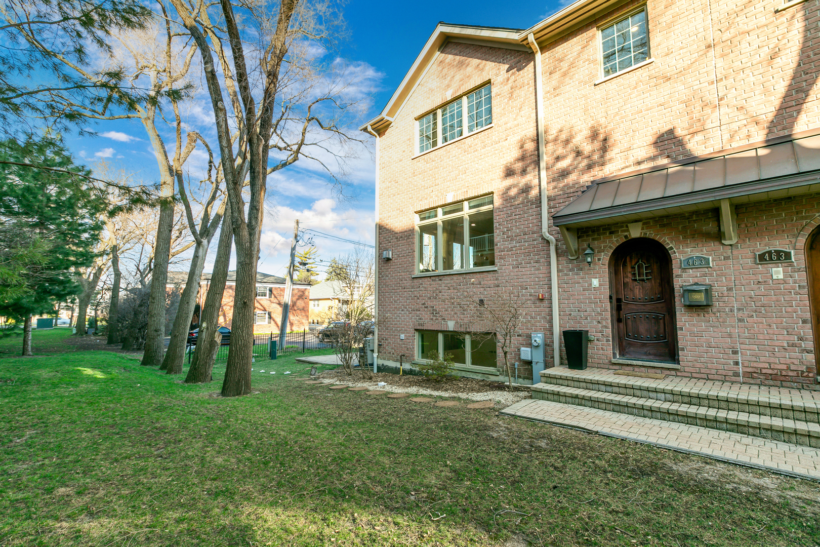 463 Summit Avenue, Unit D Park Ridge, IL 60068 - Photo 3 of 30 a view of front of a house with a yard