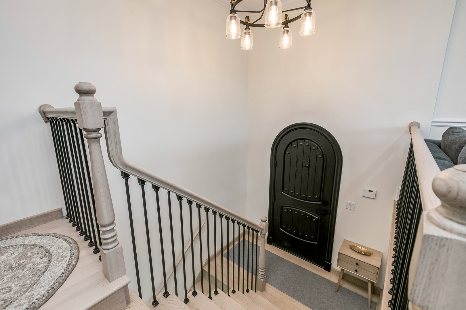 463 Summit Avenue, Unit D Park Ridge, IL 60068 - Photo 4 of 30 a view of a hallway with wooden floor and staircase
