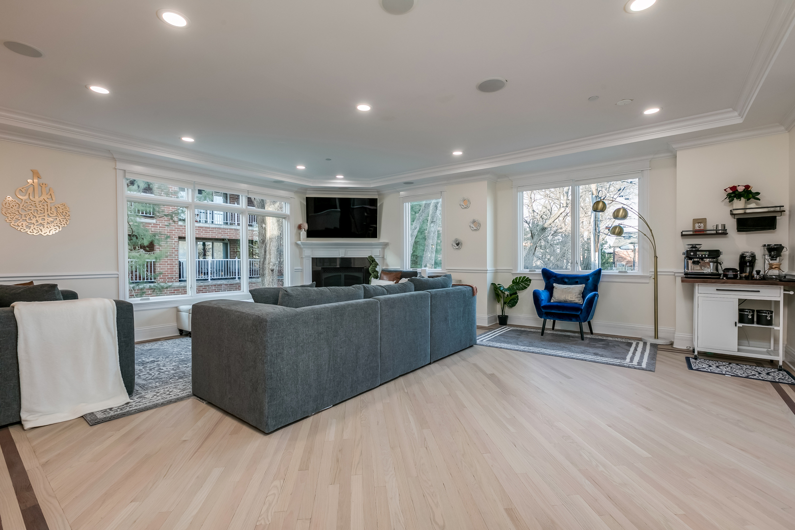 463 Summit Avenue, Unit D Park Ridge, IL 60068 - Photo 7 of 30 a living room with furniture and a flat screen tv