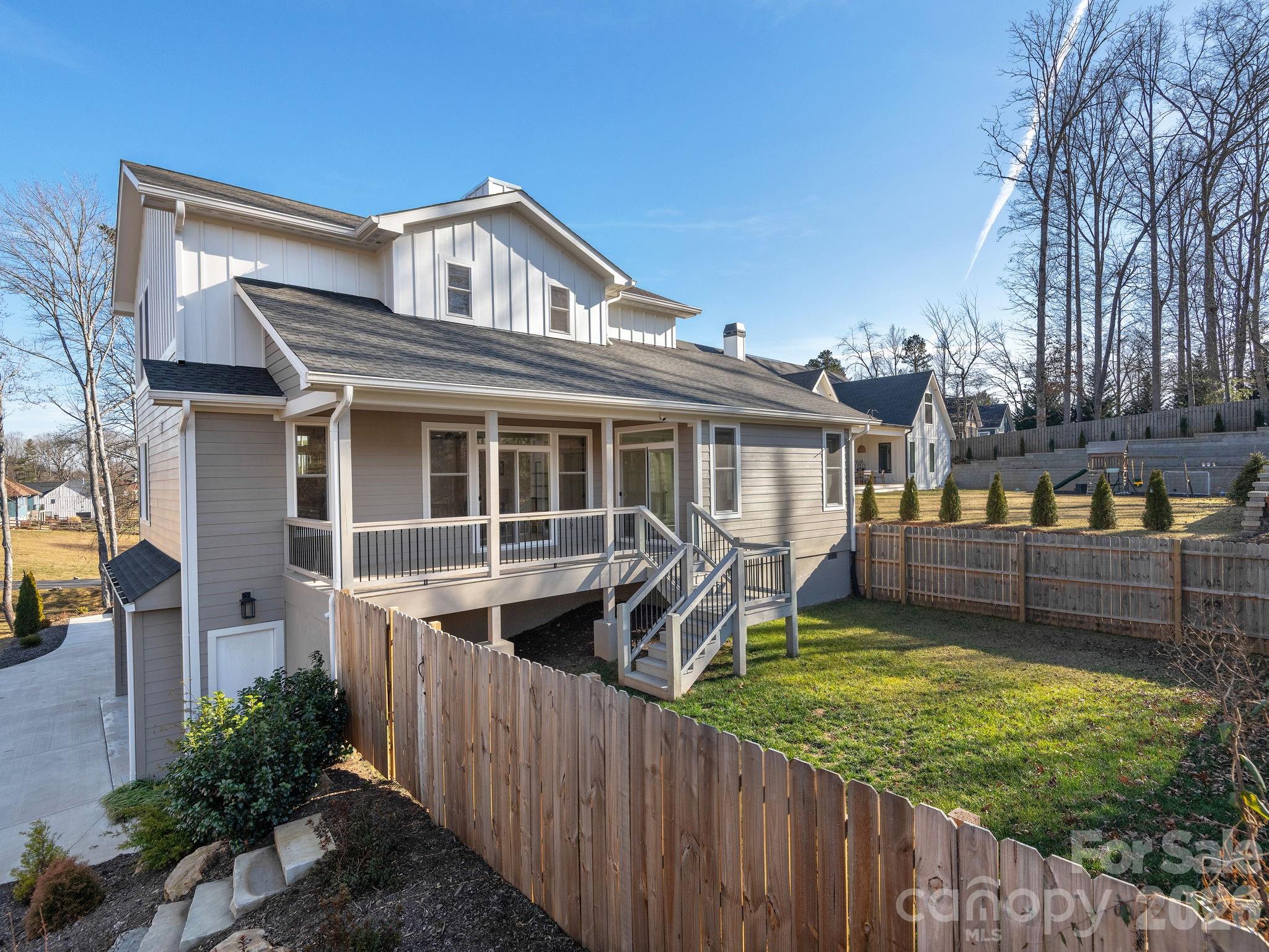 7 Copper Mill Court Candler, NC 28715 - Photo 29 of 32 a front view of a house with a yard