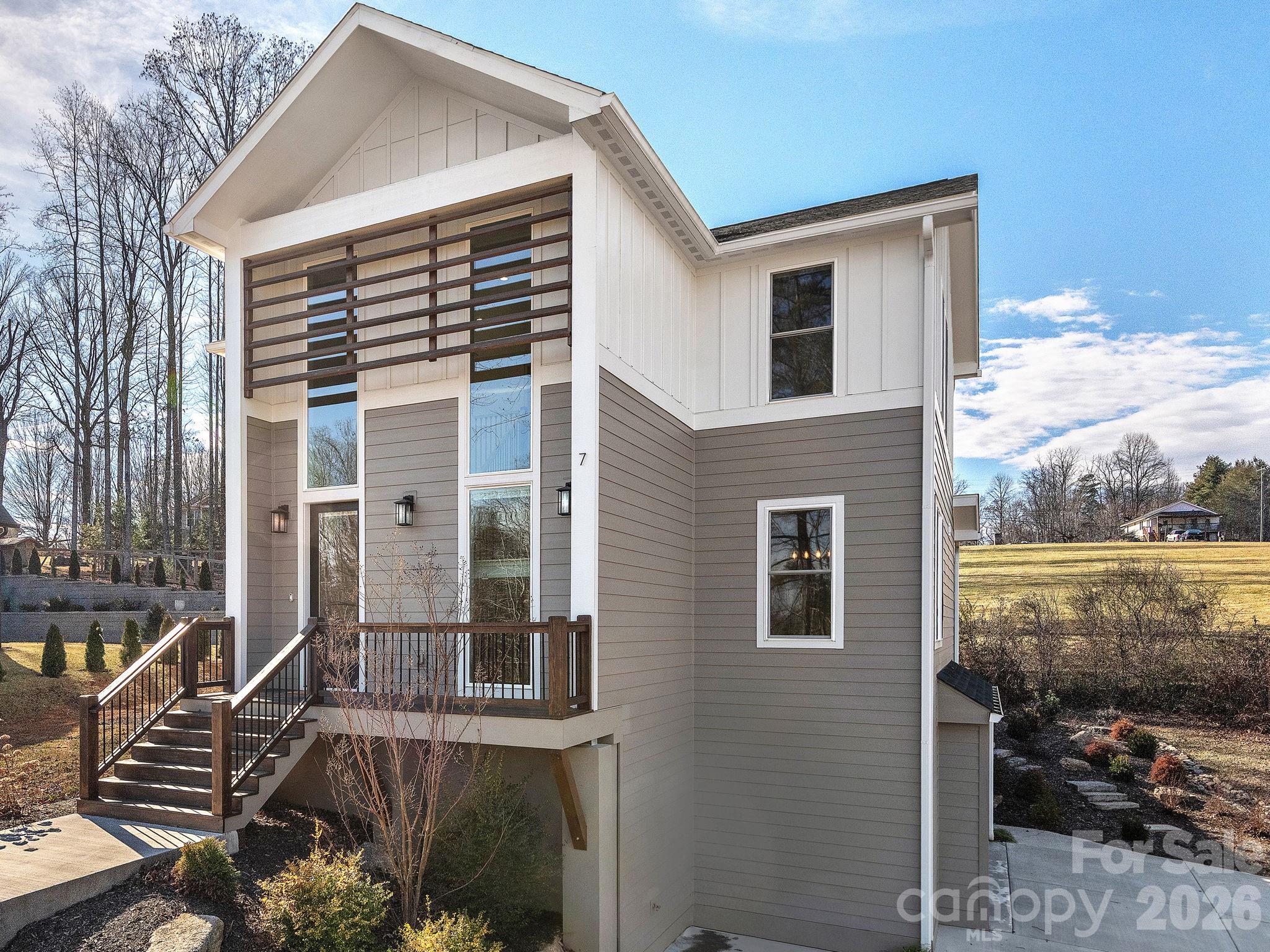 7 Copper Mill Court Candler, NC 28715 - Photo 32 of 32 a front view of a house with a yard