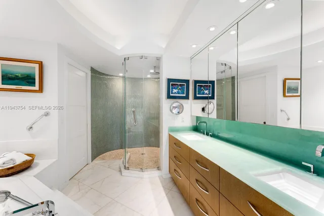 a balcony with furniture and next to a window