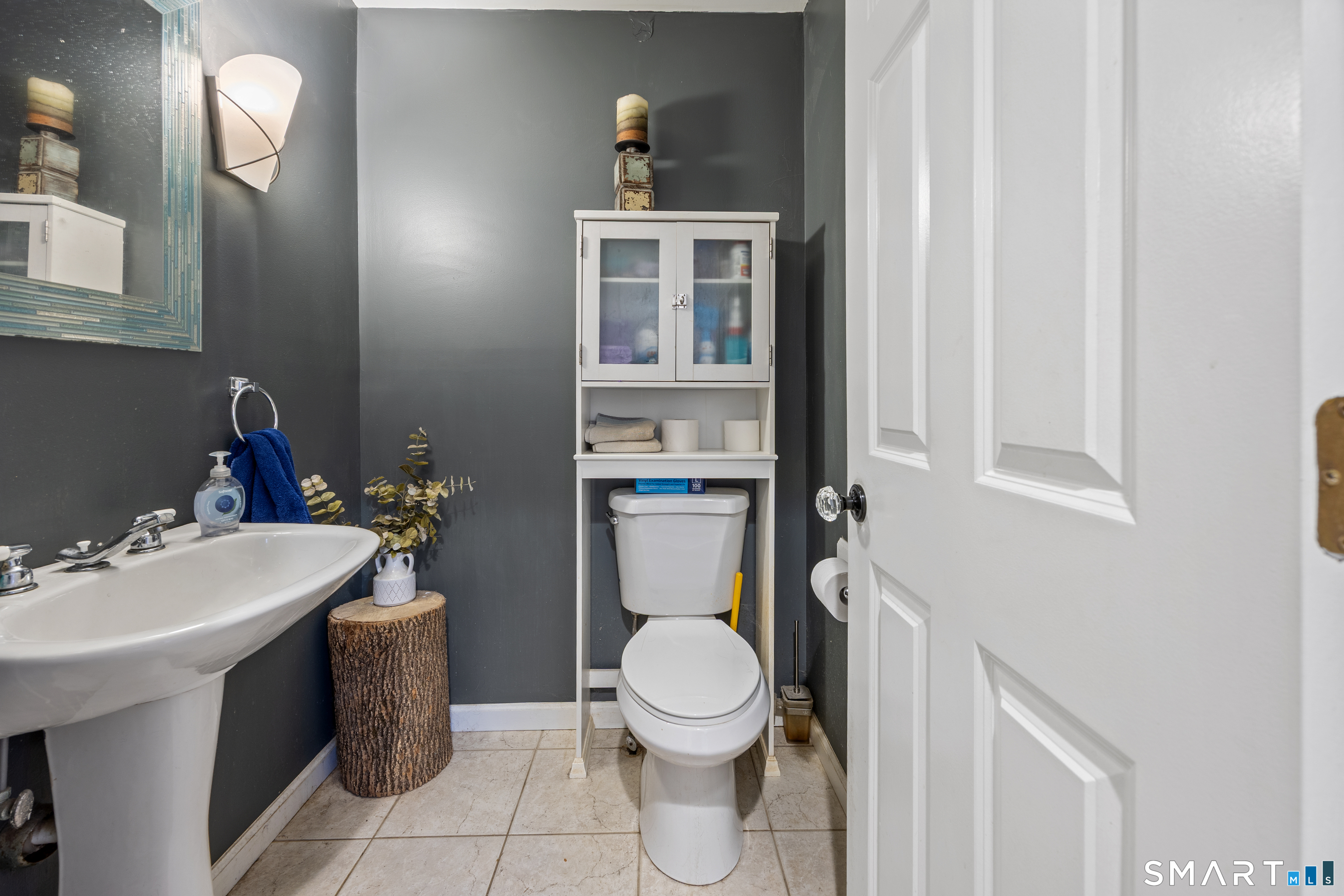 197 Preston Road Plymouth, CT 06786 - Photo 16 of 39 a bathroom with a toilet a sink and mirror