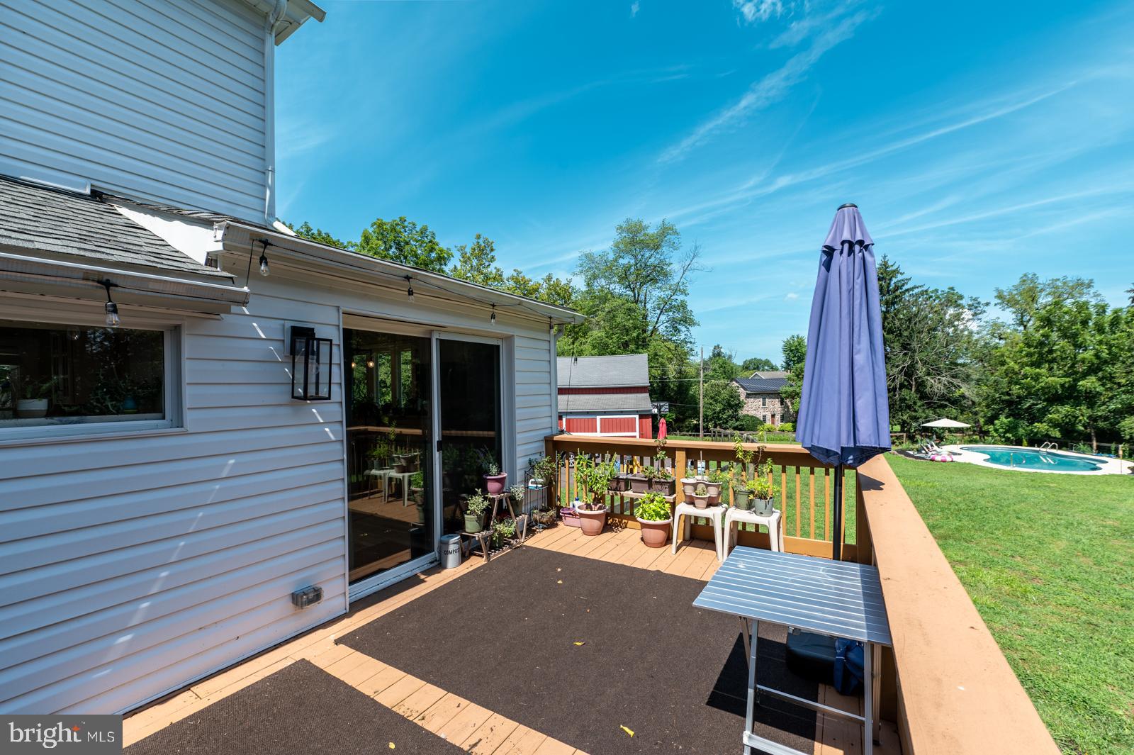 494 Baptist Church Road Spring City, PA 19475 - Photo 11 of 49 a view of a patio with a table and chairs
