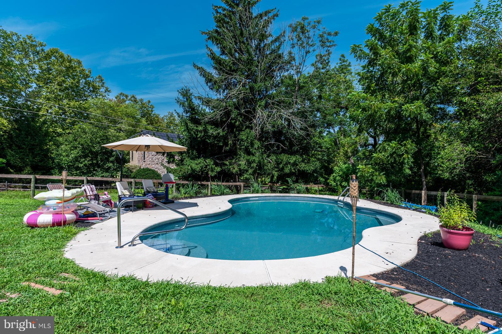 494 Baptist Church Road Spring City, PA 19475 - Photo 43 of 49 a view of a backyard with swimming pool and furniture