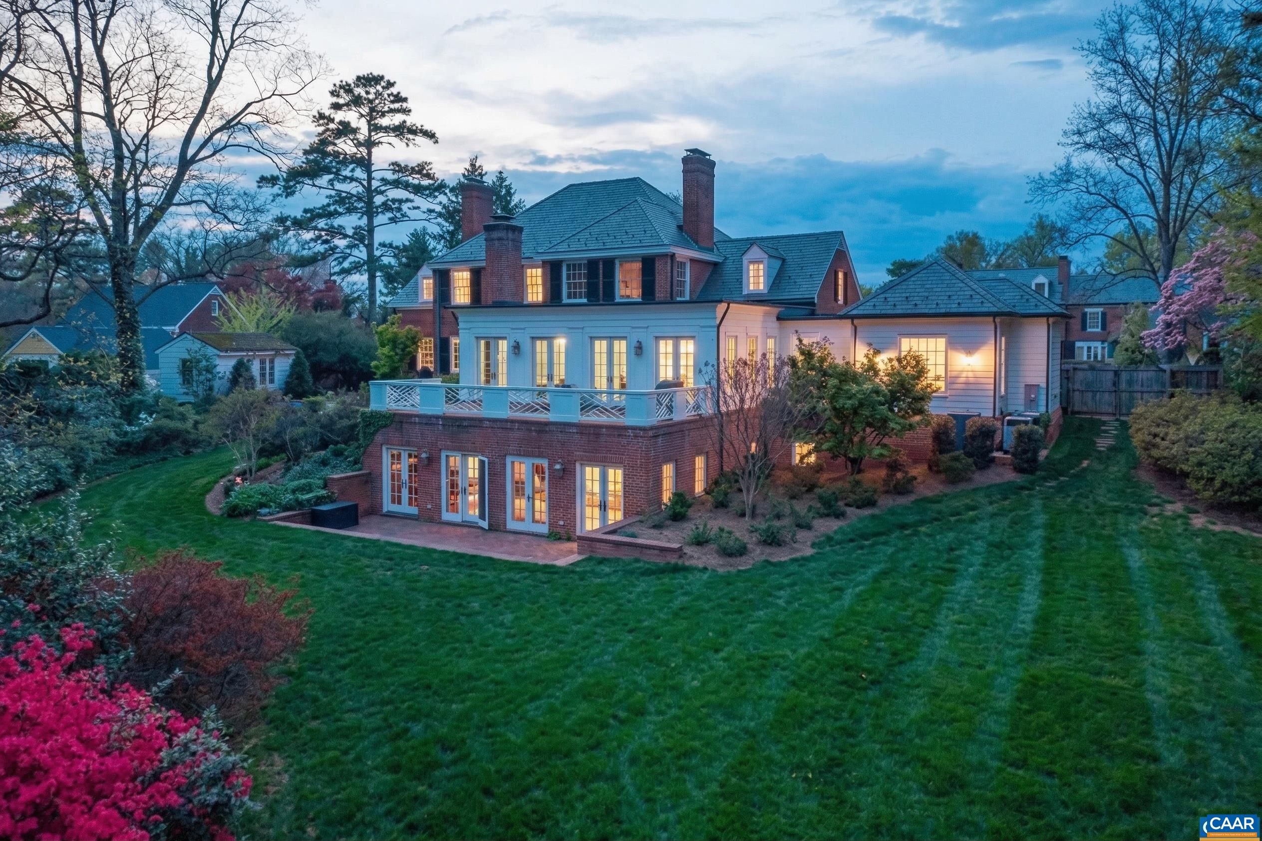 1108 Hilltop Road Charlottesville, VA 22903 - Photo 62 of 68 The 0.85 acre parcel includes this sweeping rear lawn bordered by azaleas and rhododendruns.