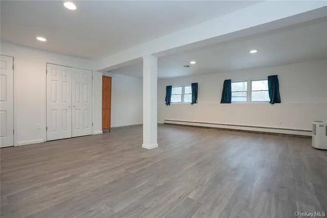 a view of livingroom and hardwood floor
