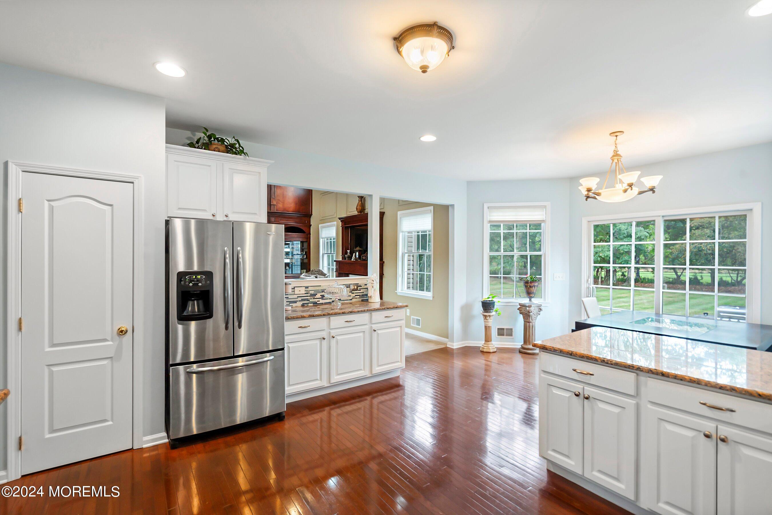5 Summers Drive Jackson, NJ 08527 - Photo 18 of 40 a kitchen with stainless steel appliances a refrigerator sink and cabinets