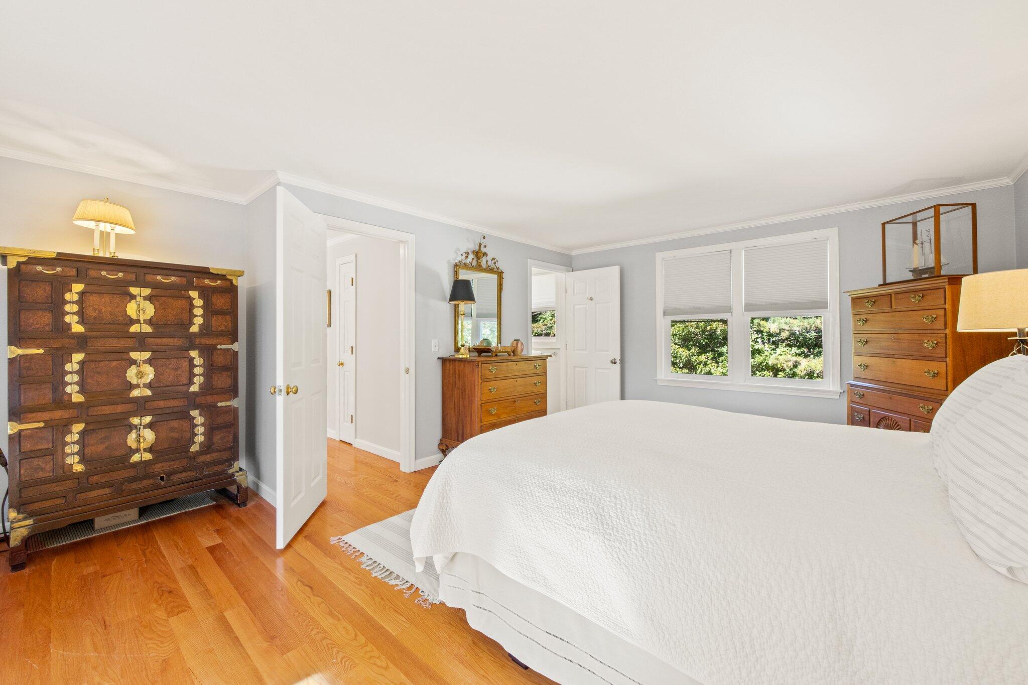 49 River Ridge Road Marstons Mills, MA 02648 - Photo 18 of 37 a bed room with a bed mirror and a window