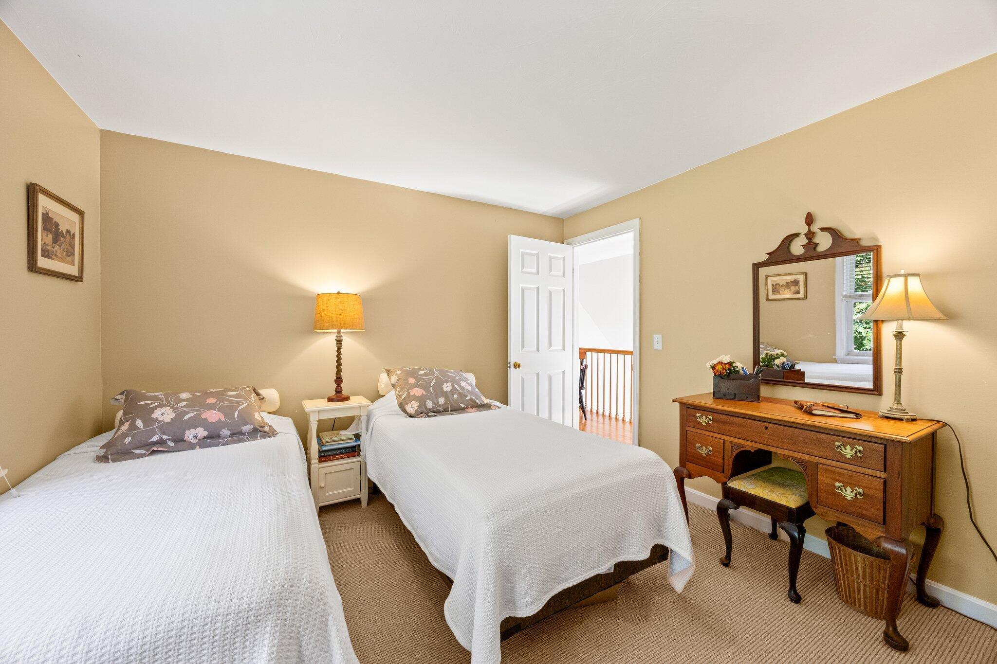 49 River Ridge Road Marstons Mills, MA 02648 - Photo 24 of 37 a bedroom with a bed and a table