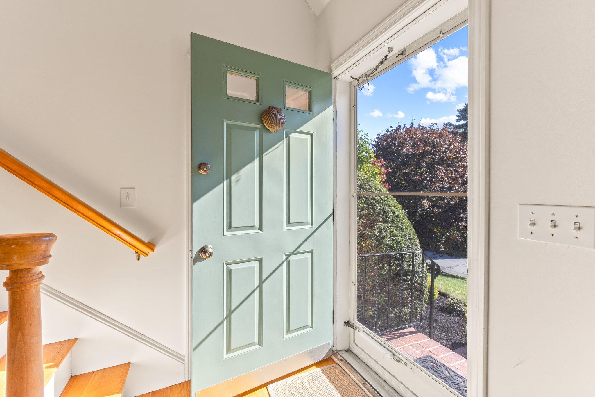 49 River Ridge Road Marstons Mills, MA 02648 - Photo 4 of 37 a view of a balcony with wooden floor and glass door
