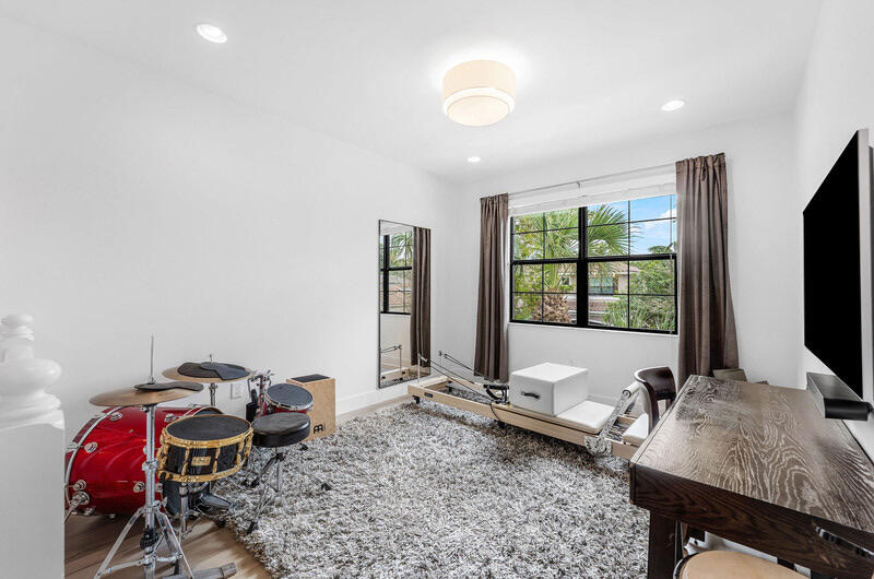 8091 Snowflake Obsidian Trail Delray Beach, FL 33446 - Photo 17 of 35 a view of a workspace with furniture and a window