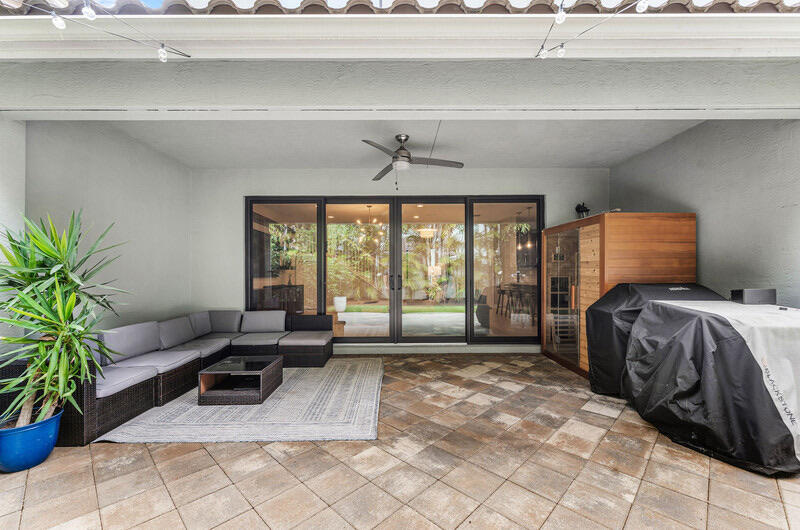 8091 Snowflake Obsidian Trail Delray Beach, FL 33446 - Photo 32 of 35 a bed room with a bed and a couch