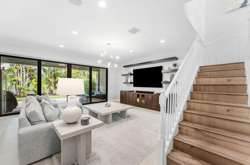 8091 Snowflake Obsidian Trail Delray Beach, FL 33446 - Photo 5 of 35 a living room with furniture and a flat screen tv