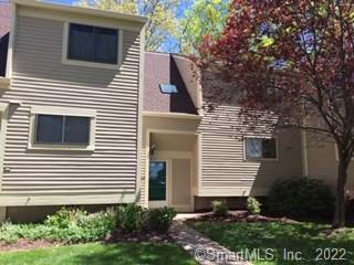 137 Sandy Point Road, Unit 137 Old Saybrook, CT 06475 - Photo 1 of 1 a view of a house with a yard