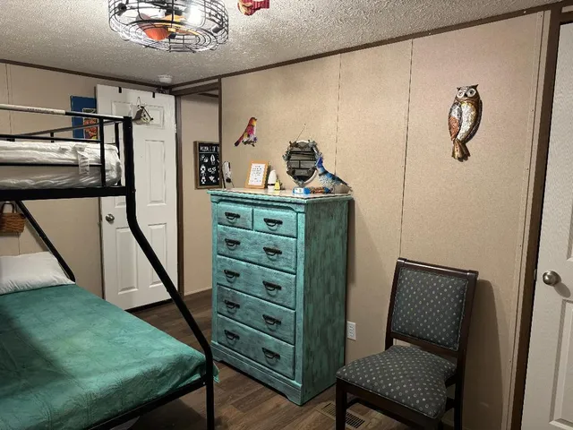 a view of hallway with furniture