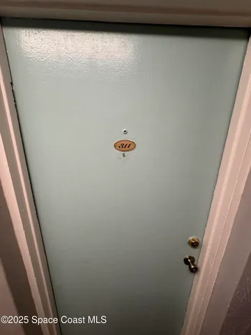 a view of a room with lots of wooden floor