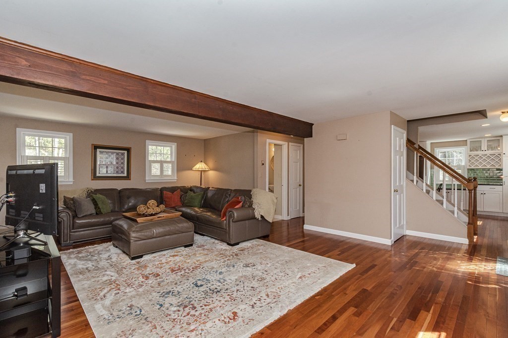 12 Lakin Road Brookline, NH 03033 - Photo 6 of 14 a living room with furniture and a rug
