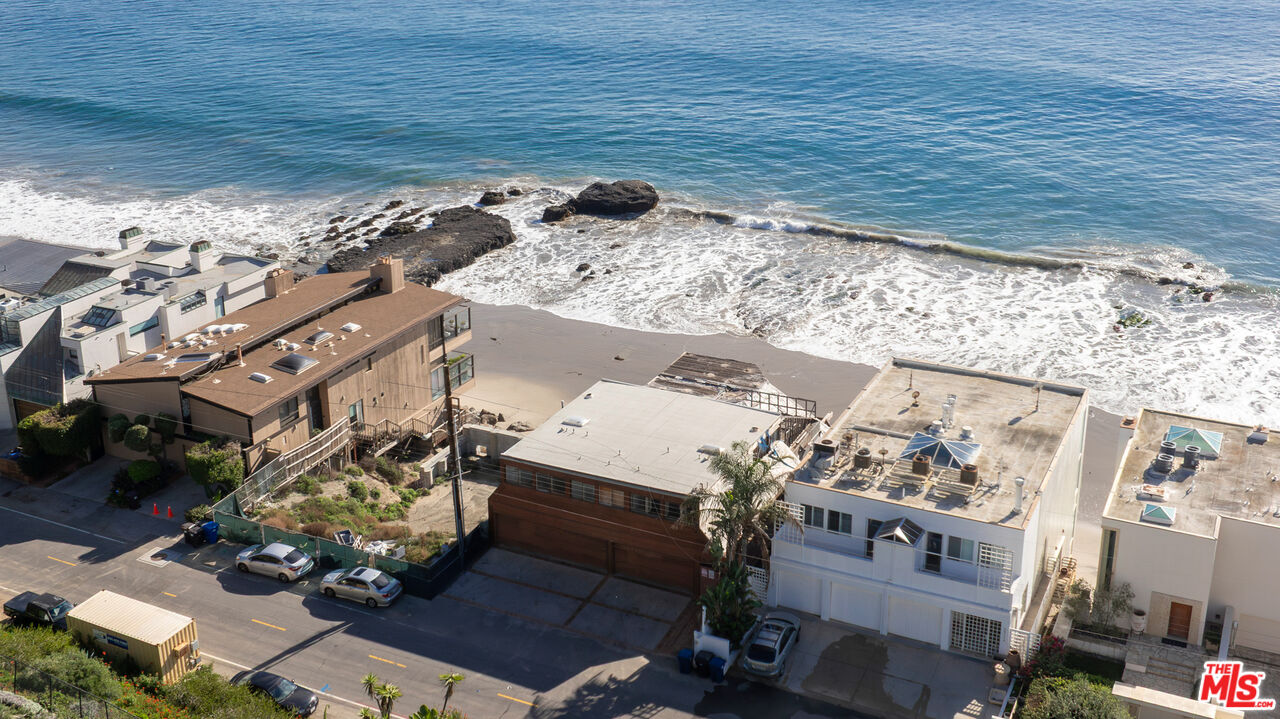 25266 Malibu Road Malibu, CA 90265 - Photo 2 of 15 a view of a terrace with wooden floor