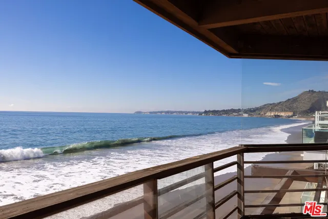a view of a backyard and a tub
