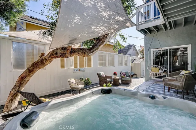 a view of a chairs and table in the patio