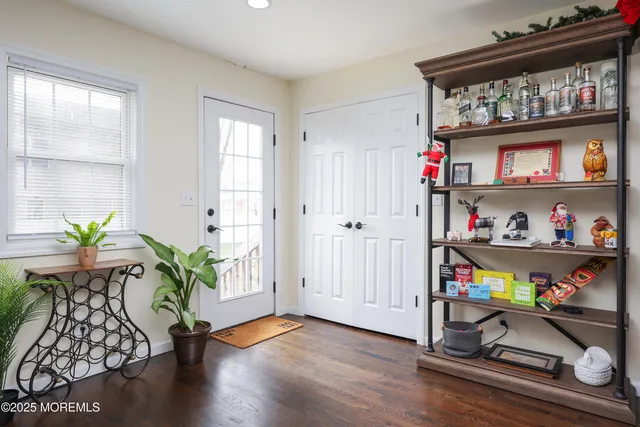 a room with furniture and a potted plant