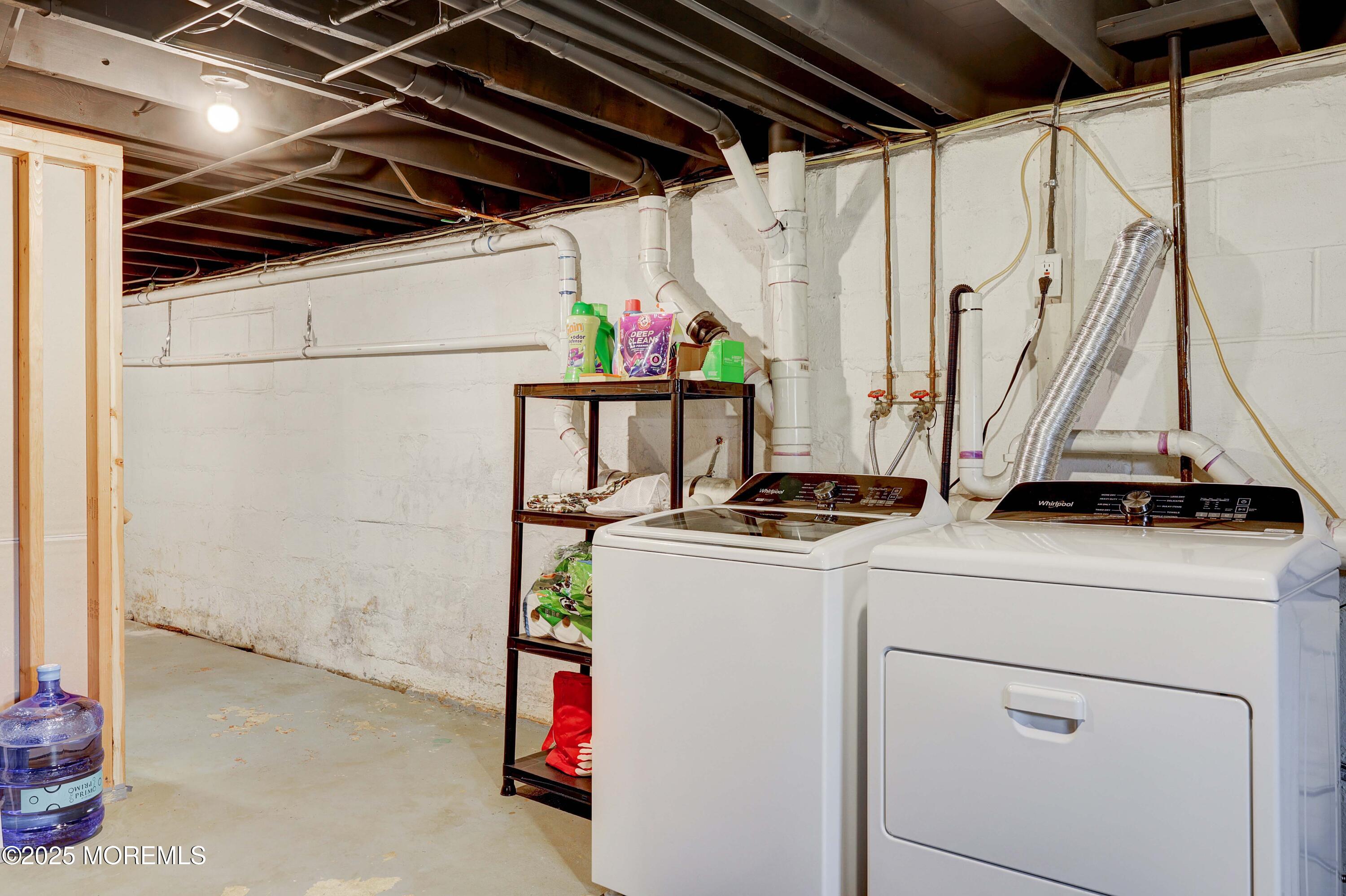 58 Richardson Avenue Eatontown, NJ 07724 - Photo 20 of 26 a view of storage and utility room with washer and dryer