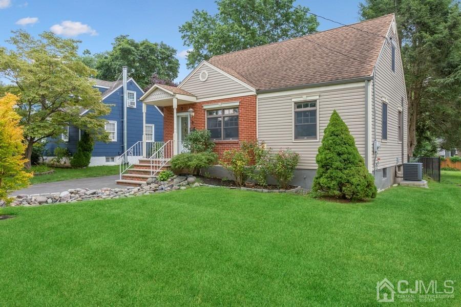 817 Dunellen Avenue Dunellen, NJ 08812 - Photo 2 of 20 a view of a house with a yard