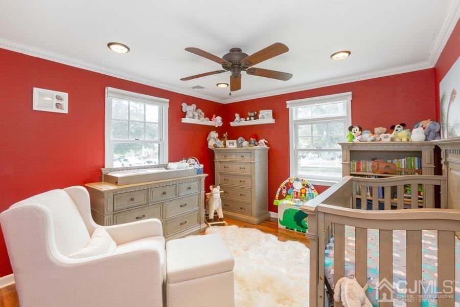 817 Dunellen Avenue Dunellen, NJ 08812 - Photo 11 of 20 a bedroom with furniture and a window