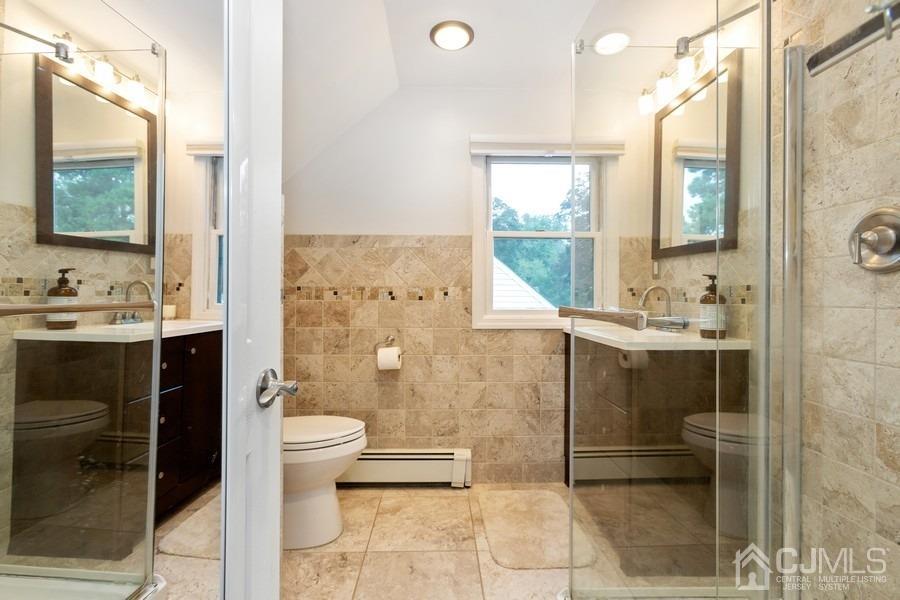817 Dunellen Avenue Dunellen, NJ 08812 - Photo 15 of 20 a bathroom with a sink toilet and shower