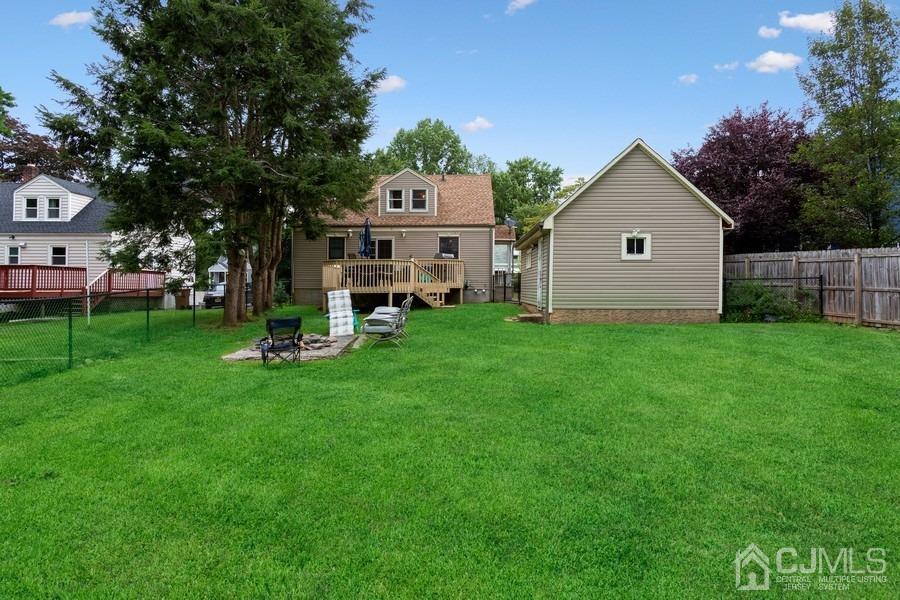 817 Dunellen Avenue Dunellen, NJ 08812 - Photo 20 of 20 a view of a house with a yard and sitting area