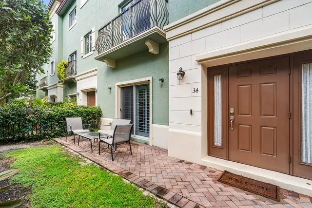 a garden view with a seating space