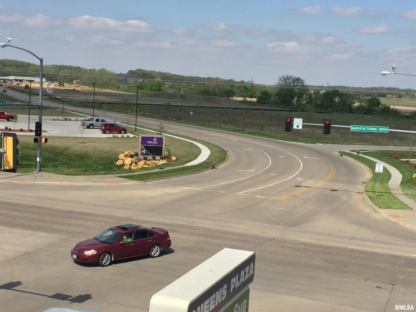 2401 Manufacturing Drive Clinton, IA 52732 - Photo 11 of 17 a view of a lake from a terrace