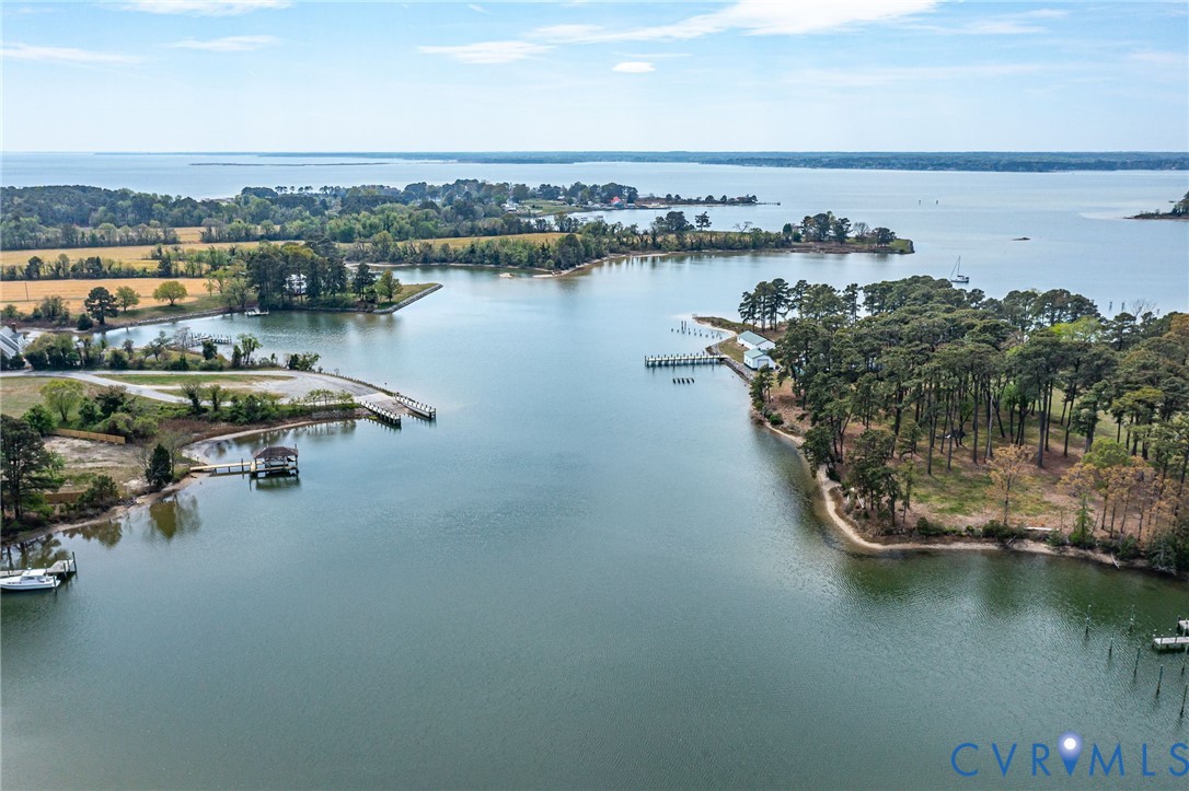 193 Deep Water Lane Reedville, VA 22539 - Photo 46 of 84 a view of a lake with houses