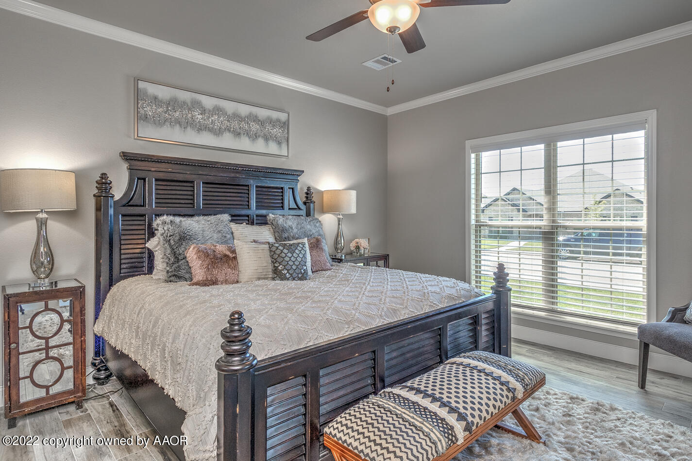 6103 Bowery Amarillo, TX 79119 - Photo 13 of 23 a bed room with a bed and a chandelier