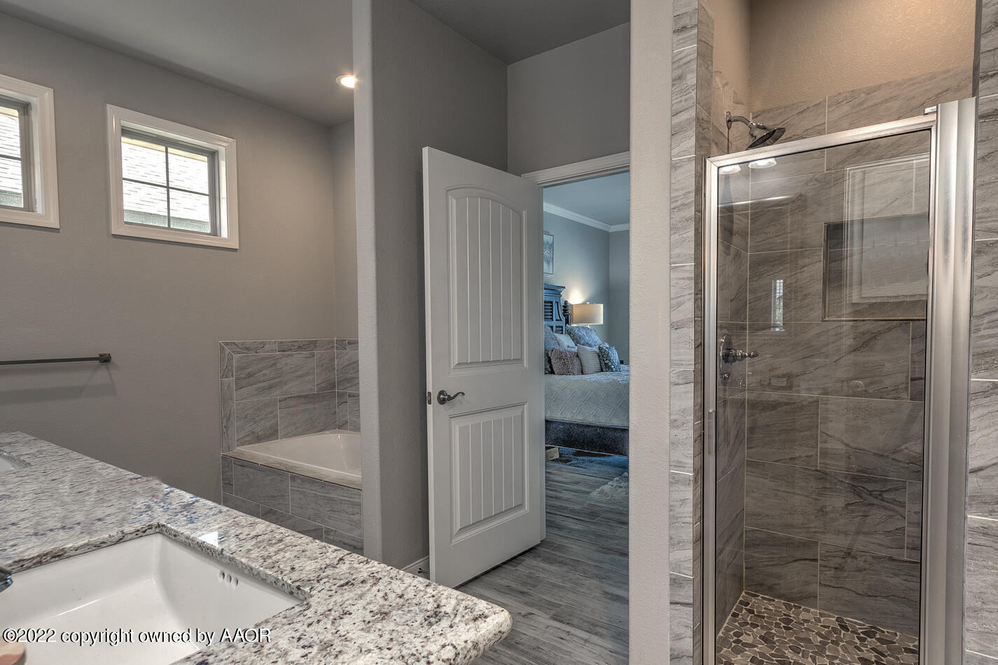 6103 Bowery Amarillo, TX 79119 - Photo 16 of 23 a bathroom with a tub and shower