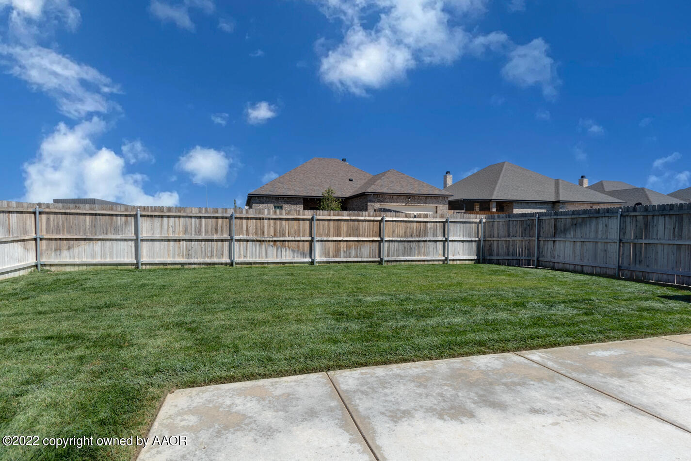 6103 Bowery Amarillo, TX 79119 - Photo 23 of 23 a view of a backyard with a garden and outdoor seating