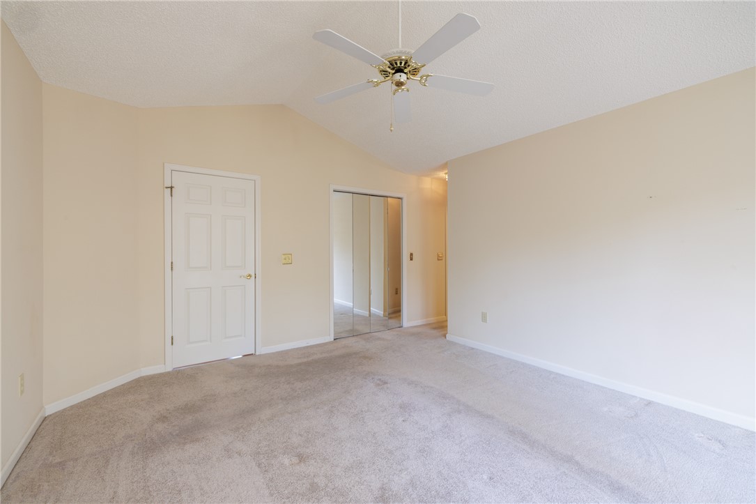 47 Gulf Stream Lane Salem, SC 29676 - Photo 12 of 48 This spacious bedroom offers comfortable carpeting and a cooling ceiling fan, ready for your personal touch.
