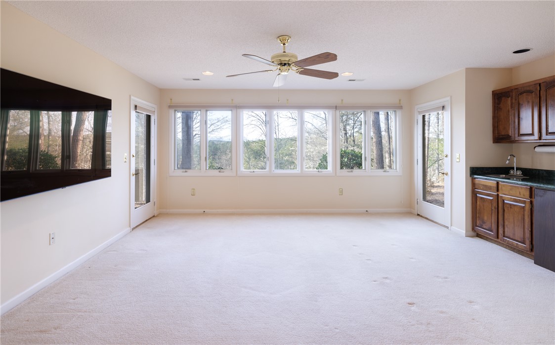 47 Gulf Stream Lane Salem, SC 29676 - Photo 15 of 48 This bright space features ample natural light and direct outdoor access.