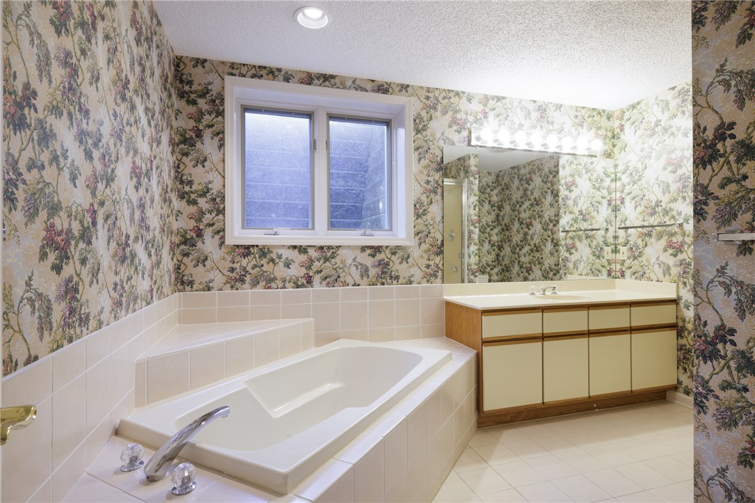 47 Gulf Stream Lane Salem, SC 29676 - Photo 18 of 48 This bathroom features a soaking tub, a vanity, and a large mirror.
