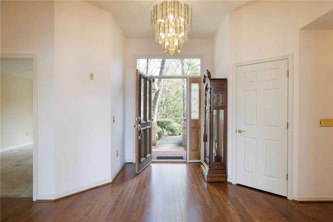 47 Gulf Stream Lane Salem, SC 29676 - Photo 2 of 48 Step into this welcoming entrance foyer featuring rich hardwood flooring and a stylish chandelier.