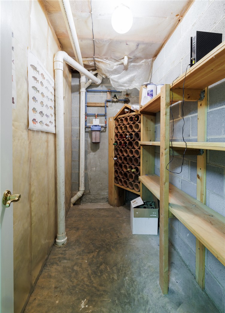 47 Gulf Stream Lane Salem, SC 29676 - Photo 21 of 48 This functional basement features concrete block walls and convenient storage, ideal for practical use.