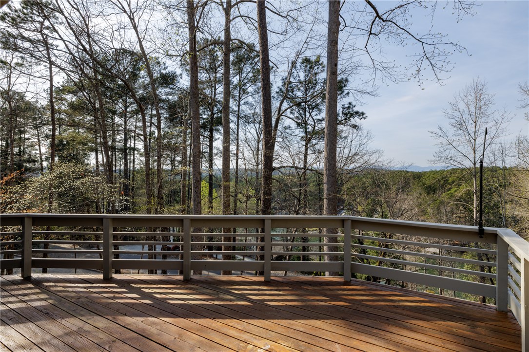 47 Gulf Stream Lane Salem, SC 29676 - Photo 26 of 48 Enjoy expansive outdoor living on this deck, overlooking lush trees and distant mountains.