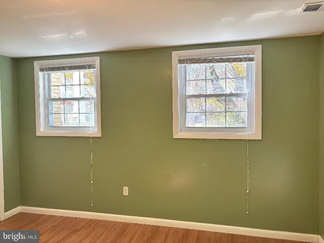 a view of a room that has a window in it