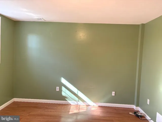 a view of room and wooden floor