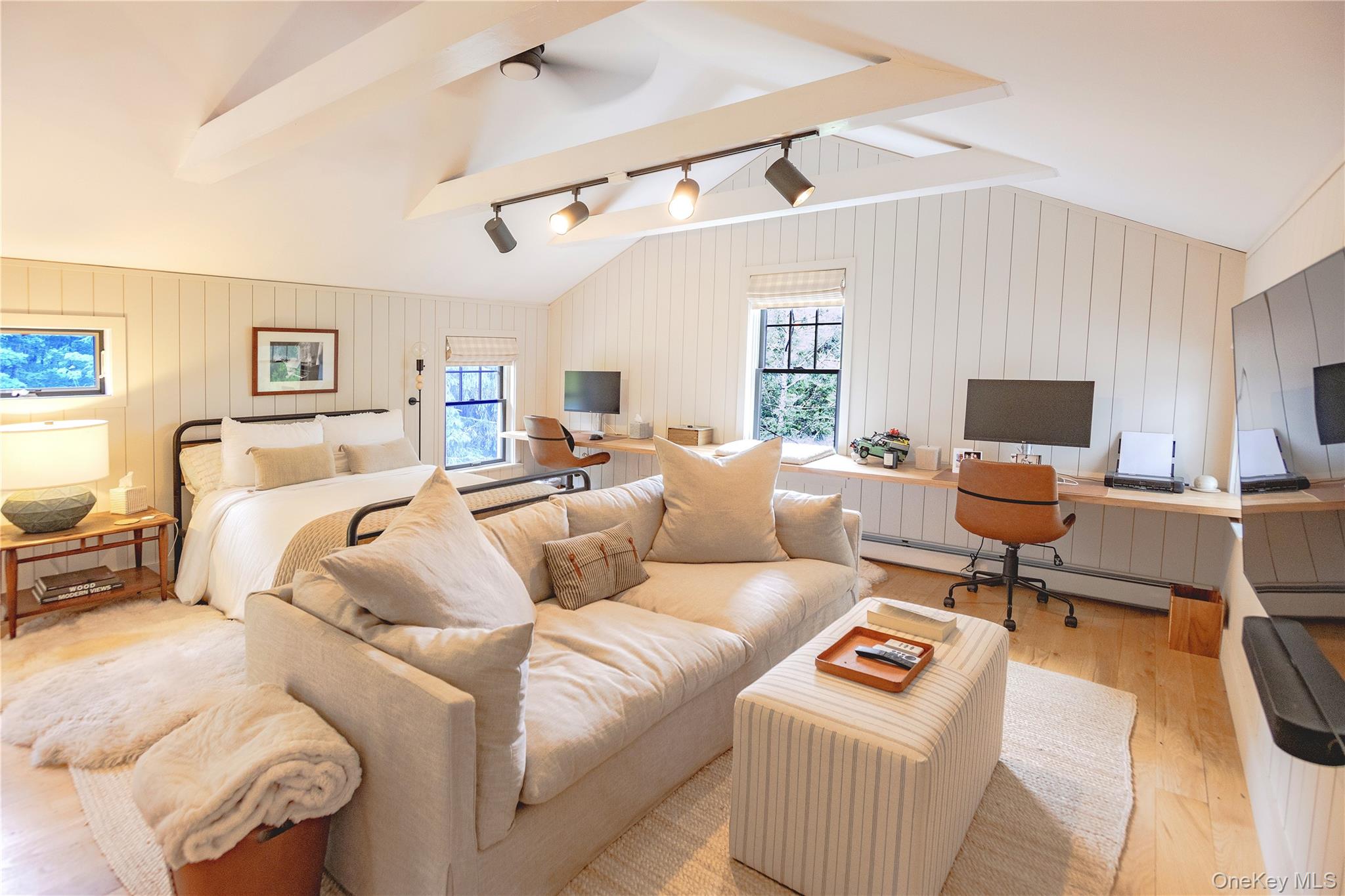 340 Upper Pine Kill Road Wurtsboro, NY 12790 - Photo 10 of 13 Large, combination media room, office/work room and bedroom with vaulted ceilings and views of the great room and three sides of the exterior.