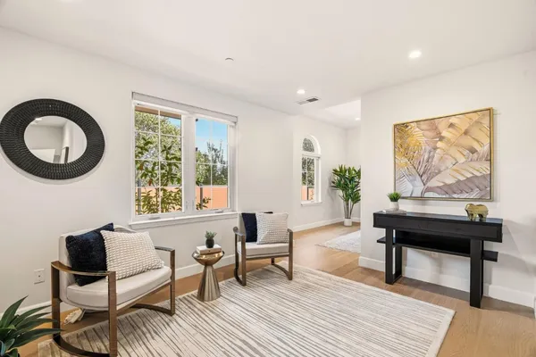 a kitchen with stainless steel appliances a refrigerator sink and stove