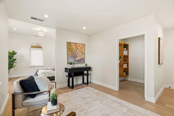 a view of a hallway with washer and dryer