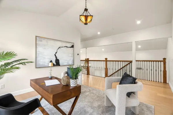 a view of a deck with couches floor to ceiling window with wooden floor